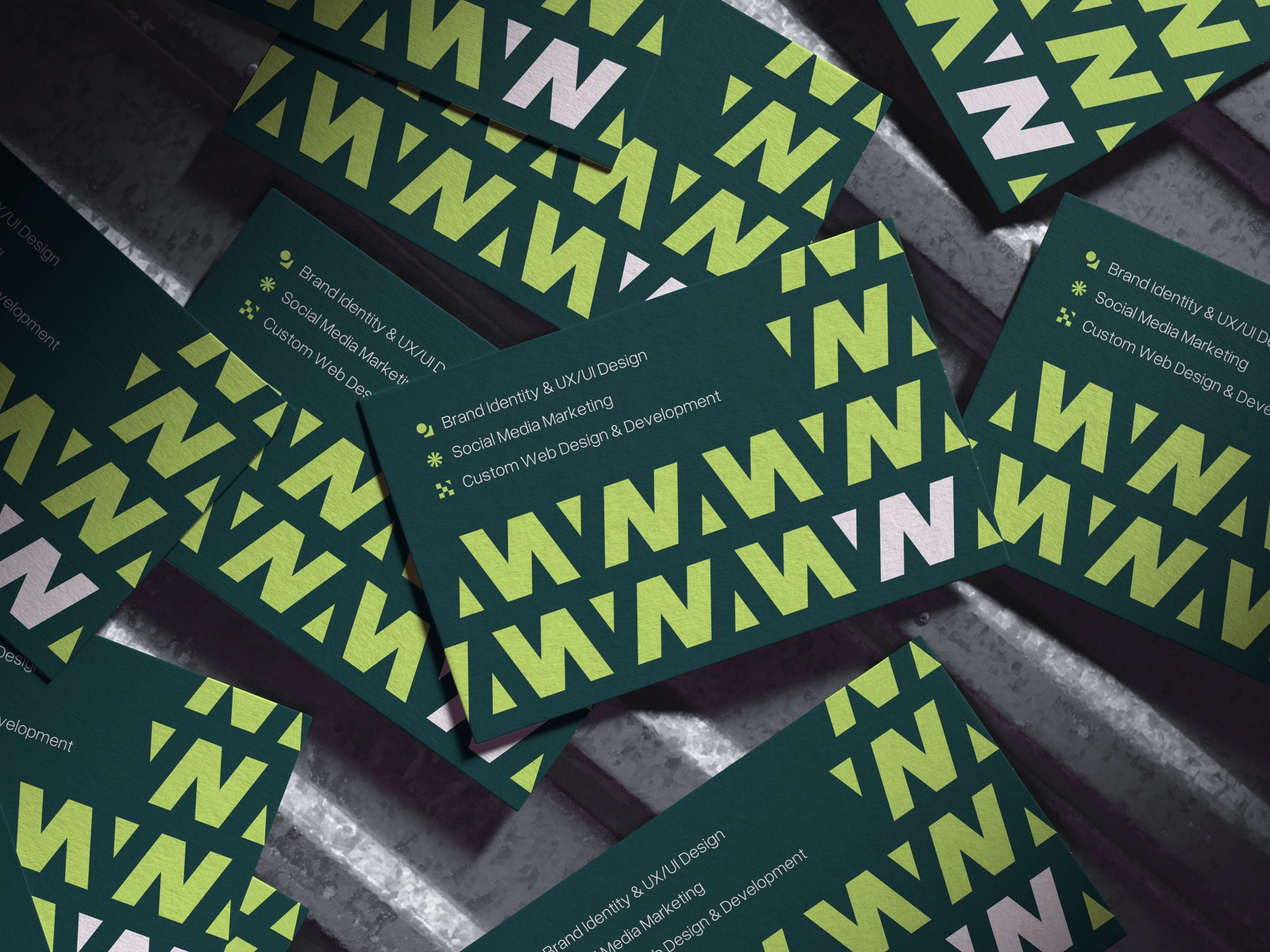 Webnem brand identity on original green and lime business cards